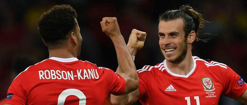 Schlag ein. Superstar Gareth Bale (r.) ist einer unter vielen bei den Walisern.