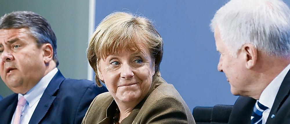 "Deutschland kann das" - Angela Merkel mit ihren Koalitionspartnern.