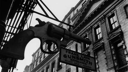 Berenice Abbott, Gunsmith and Police Department 6 Centre Market Place and 240 Centre Street, Manhattan, 1937.