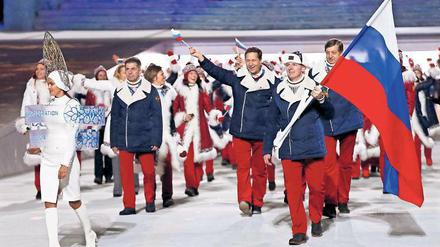 Die russische Olympiamannschaft bei der Eröffnungsfeier der Winterspiele in Sotschi 2014. In Rio könnte Russland ganz fehlen. 