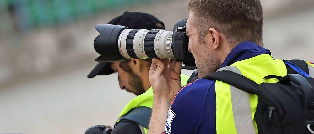 Profi-Fotografen bei der Arbeit. 
