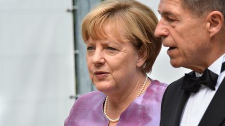 Bundeskanzlerin Angela Merkel (CDU) und ihr Ehemann Joachim Sauer am 1. August bei den Bayreuther Festspielen.