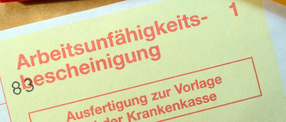 Eine Arbeitsunfähigkeitsbescheinigung - Ausfertigung zur Vorlage bei der Krankenkasse.