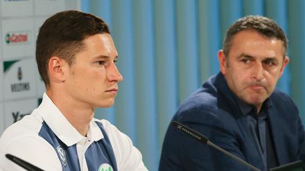 Gute Stimmung sieht anders au. Julian Draxler (li.) und VfL-Manager Klaus Allofs.