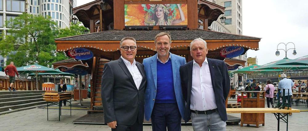 Die Macher am „Olympiaturm“. Bernd Andrich, Klaus-Jürgen Meier und Arnold Bergmann (v.l.n.r.) laden zum „Summer in the City“ ein.