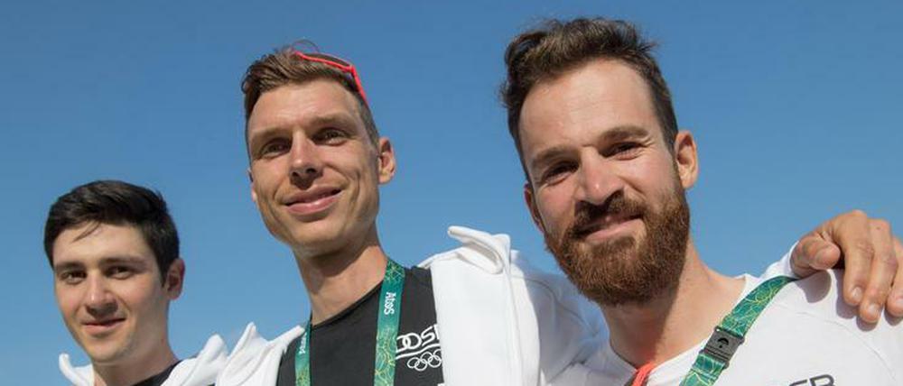 Bitte lächeln. Die deutschen Radrennfahrer Emanuel Buchmann, Tony Martin and Simon Geschke (von links). 