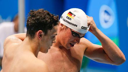 Die Badekappe für immer abgelegt: Paul Biedermann (r.) beendet seine Karriere.