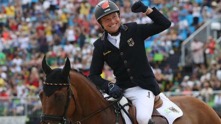 Das Strahlen des Siegers. Michael Jung und sein Erfolgspferd Sam