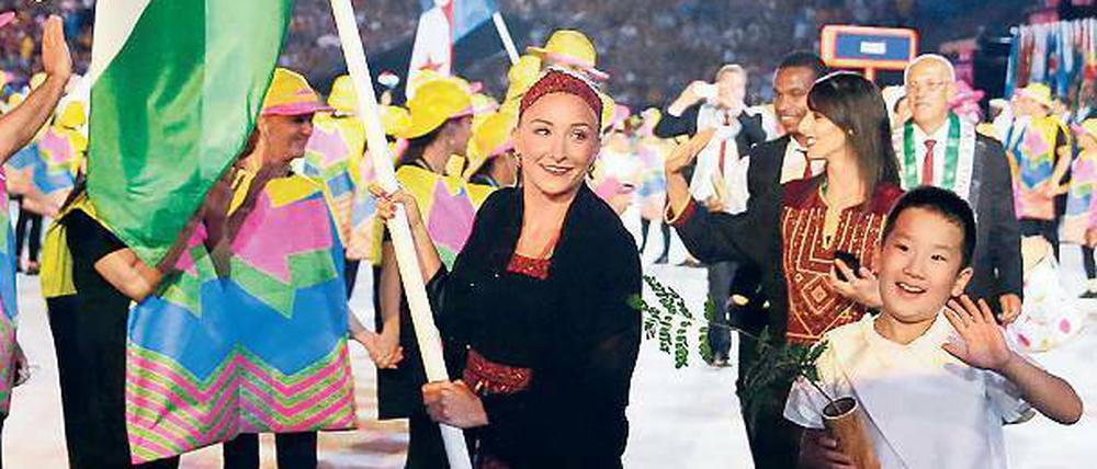 Repräsentantin. Mayada Al-Sayad trug die palästinensische Fahne bei der Eröffnungsfeier.