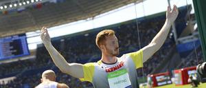 Das war es. Piotr Malachowski (hinten) hat nur Silber, Christoph Harting (vorn) hat Gold.