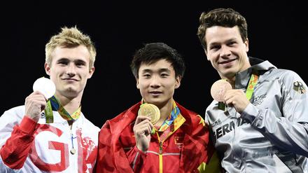 Neuland: Endlich einmal steht Patrick Hausding (r.) nach einem großen internationalen Wettkampf auf dem Podium. 