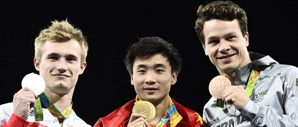 Neuland: Endlich einmal steht Patrick Hausding (r.) nach einem großen internationalen Wettkampf auf dem Podium.