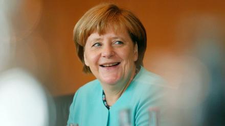 Freundlich - aber in der Frage der Kandidatur unverbindlich: Kanzlerin Angela Merkel.
