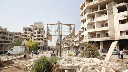 Zerstörte Häuser wie hier in Darayya bei Damaskus sind in vielen Städten in Syrien zu sehen. 