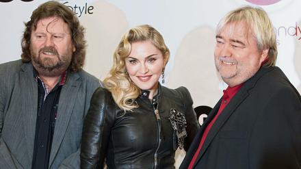 Große Hoffnungen: Popsängerin Madonna und die Unternehmer Jürgen (l) und Ralf Jopp 2013 in Zehlendorf bei der Eröffnung des ersten Hard Candy-Clubs in Berlin.