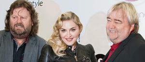 Große Hoffnungen: Popsängerin Madonna und die Unternehmer Jürgen (l) und Ralf Jopp 2013 in Zehlendorf bei der Eröffnung des ersten Hard Candy-Clubs in Berlin.