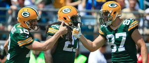 Business as usual: Aaron Rodgers (l.) führt seine Green Bay Packers mal wieer mit spektakulären Aktionen zum Sieg.