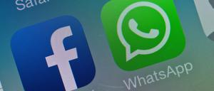 Die beiden Logos von Facebook und WhatsApp.