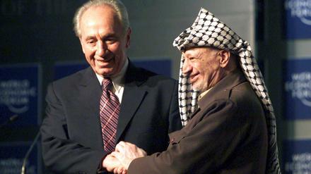 Shimon Peres trifft hier Ende Januar 2001 den damaligen Palästinenserführer Jassir Arafat.