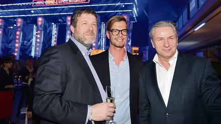 Der Geschäftsführer der Modemesse "Bread & Butter", Karl-Heinz Müller, Moderator Joko Winterscheidt und der damals noch Regierende Bürgermeister von Berlin Klaus Wowereit im Januar 2014 in Berlin bei der Eröffnung der Messe. Mit Müller hatte sich Wowereit in der "Paris Bar" getroffen.