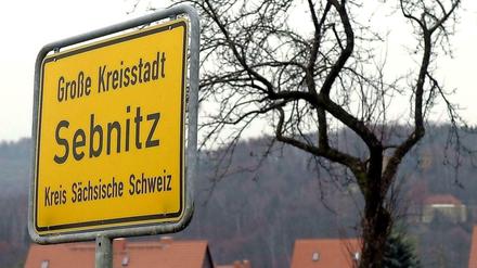 Ortseingangsschild der sächsischen Stadt Sebnitz.