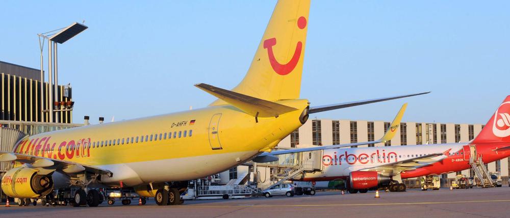 Unterschiedliche Farben, aber wirtschaftlich eng verbunden: Tuifly und Air Berlin.