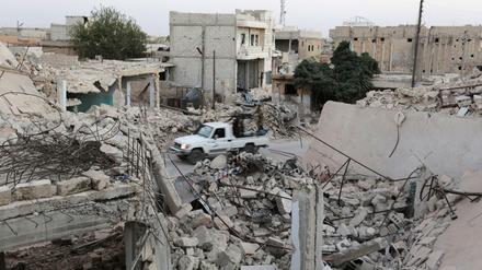 Kämpfer der Rebellen im zerstörten Aleppo. 