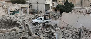 Kämpfer der Rebellen im zerstörten Aleppo. 