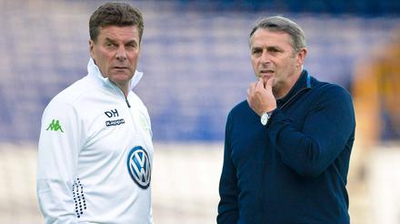 Servus, Dieter. Manager Allofs (rechts) mit Ex-Trainer.