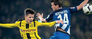 Ist das Kunst oder kann das weg? Valentin Stocker und Hertha BSC spielten gegen Julian Weigls Dortmunder nicht immer schön, aber dafür zielführend. Foto: dpa/Kusch