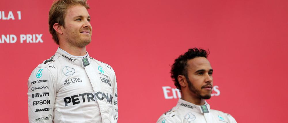 Das macht keinen Spaß. Hamilton (rechts) in Japan neben Sieger Rosberg.
