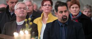 Der Vorsitzende des Zentralrats der Muslime in Deutschland, Aiman Mazyek (rechts) neben Regionalbischof Stefan Ark Nitsche