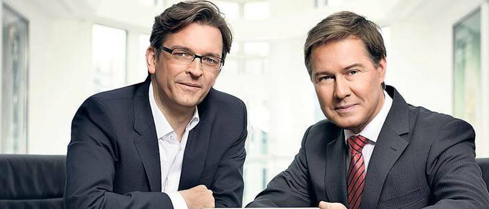 Aktenübergabe. Claus Strunz (links) wird von Januar an statt Ulrich Meyer das Sat-1-Magazin moderieren.