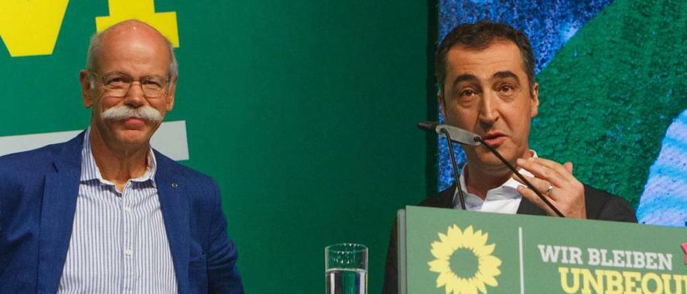 Grünen-Vorsitzender Cem Özdemir versucht die Wogen vor dem Auftritt des Daimler-Chefs Dieter Zetsche beim Parteitag der Grünen zu glätten.