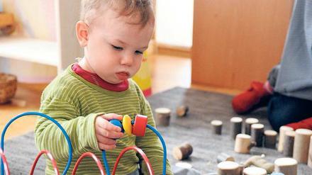 Spielerisch. Möglichst viele Kinder sollen schon mit einem Jahr in die Kita – die Aufnahme wird einfacher. 