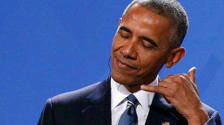 Bei Fragen gern anrufen! US-Präsident Obama während der Pressekonferenz mit Kanzlerin Merkel.