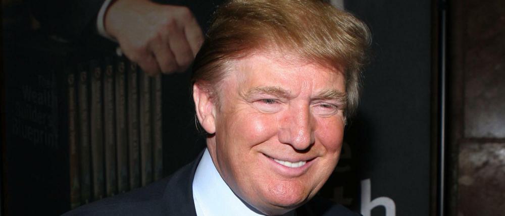 Da freute er sich noch: Donald Trump bei einer Buchpräsentation zur Gründung der "Trump University" im Mai 2005