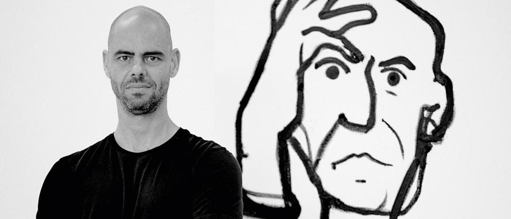 Der israelische Künstler Eran Shakine neben einer seiner Zeichnungen im Jüdischen Museum.