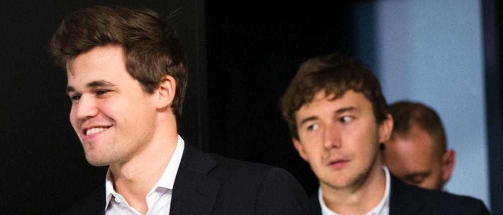 Magnus Carlsen (links) setzte sich am Ende doch gegen Sergej Karjakin durch.