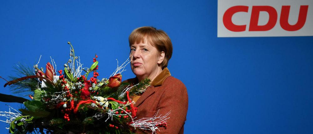 Blumen für die Chefin: Ein Strauß für Angela Merkel