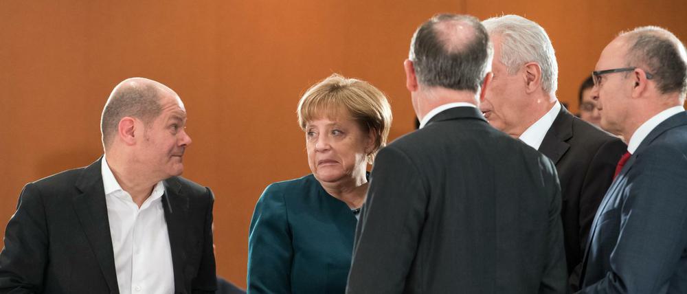 Die Kanzlerin im Kreis der Ministerpräsidenten (Scholz, Weil, Tillich, Sellering).
