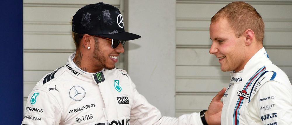 Lewis Hamilton (l.) und Valtteri Bottas (r.).