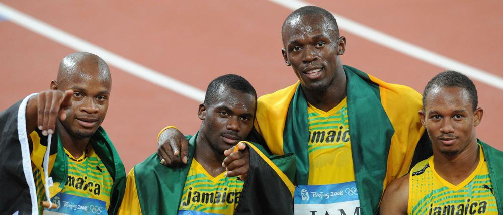 Da feierten sie noch. Asafa Powell, Nesta Carter, Usain Bolt und Michael Frater müssen ihr Staffel-Gold von Peking zurückgeben. 