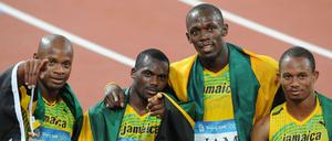 Da feierten sie noch. Asafa Powell, Nesta Carter, Usain Bolt und Michael Frater müssen ihr Staffel-Gold von Peking zurückgeben. 