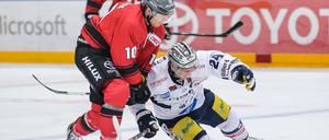 Penaltywürdig? Nö, gab nur zwei Minuten für den Kölner Ehrhoff (links) nach dem Foul gegen Rankel.