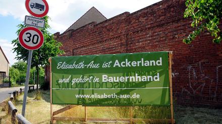 Protest gegen die Bebauung der Elisabeth-Aue. Beim Bauprojekt am Blankenburger Pflasterweg soll es besser laufen.