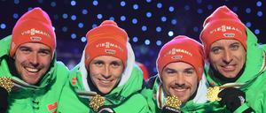Die Weltmeister (l-r) Johannes Rydzek, Eric Frenzel, Fabian Rießle, Björn Kircheisen, aus Deutschland.