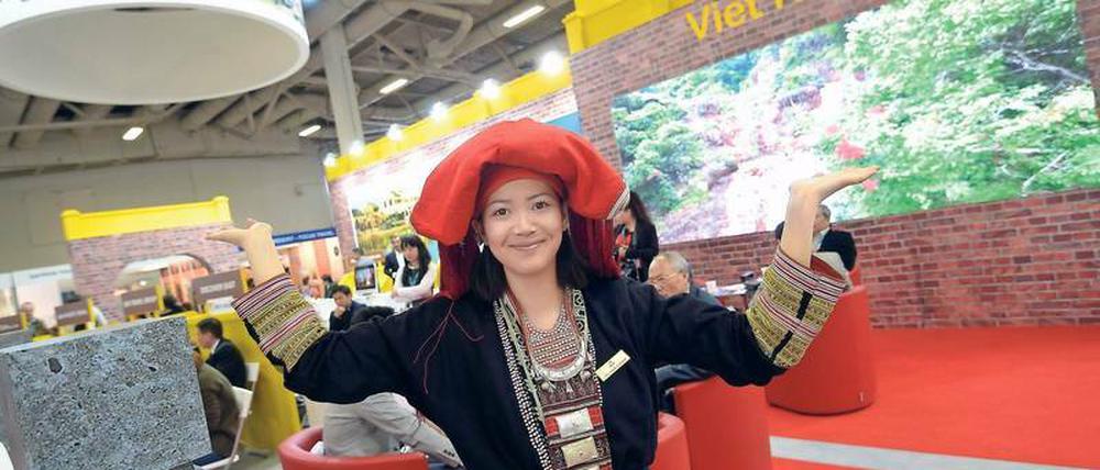 Freundlicher Empfang in Vietnam. Das Land präsentiert sich in Halle 26. Die Nachbarn Kambodscha und Laos sind natürlich auch dort.
