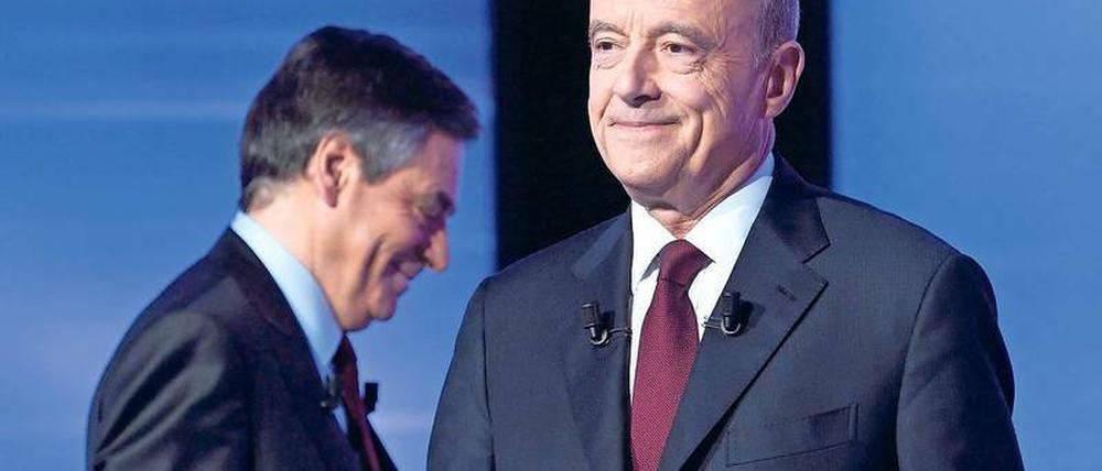 Falls der konservative Kandidat Fillon (l.) zurücktreten sollte, würde Parteikollege Juppé wohl einspringen.