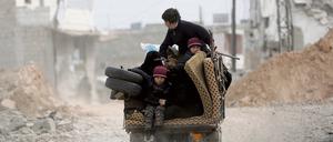 Eine syrische Familie auf der Flucht. 